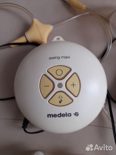 Молокоотсос medela swing maxi
