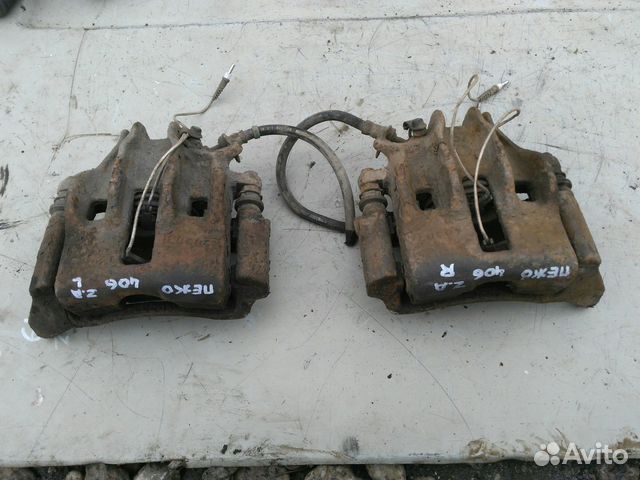 Суппорт передний правый Пежо 406