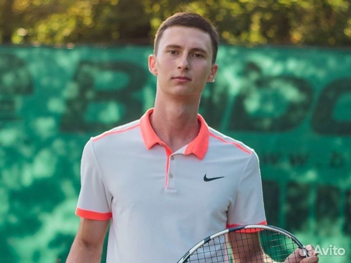 Тренер по большому теннису