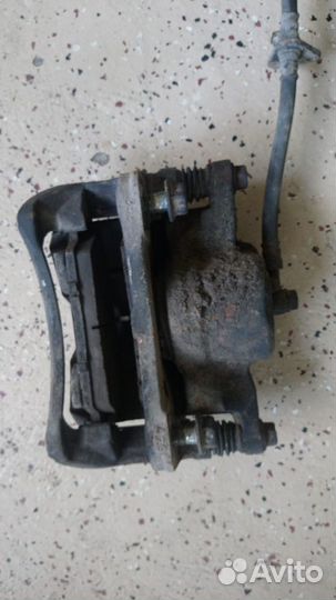 Супорт тормозной передний Хонда Рафага