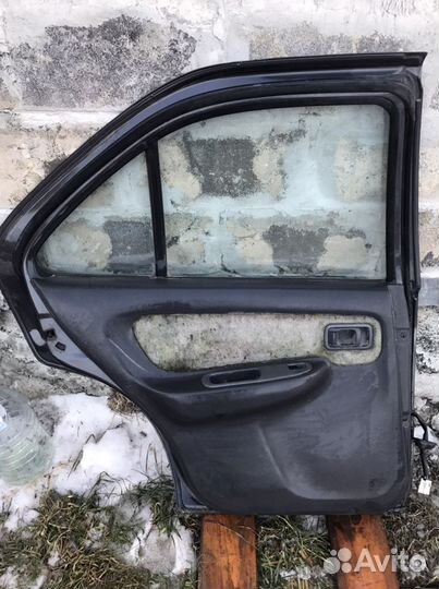 Дверь задняя левая нисан сани B 14
