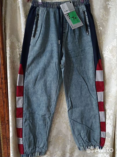 Джинсы женские внизу на резинке