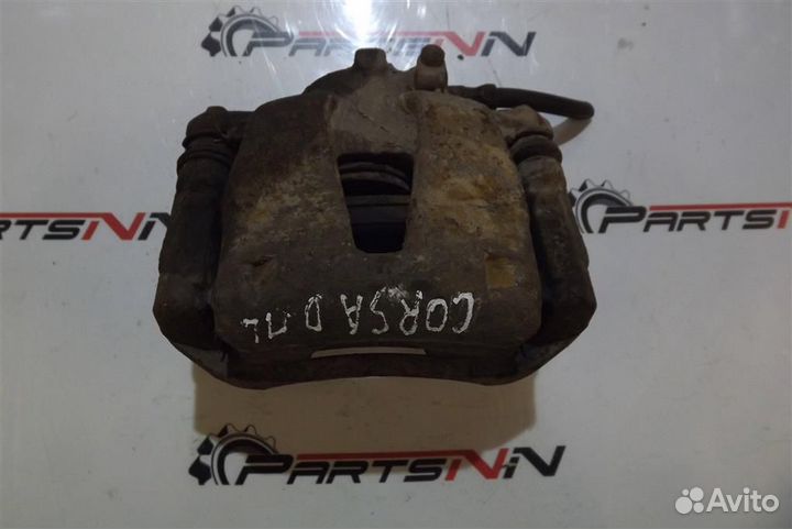 Суппорт передний левый Опель Корса Д