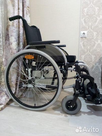Инвалидная коляска
