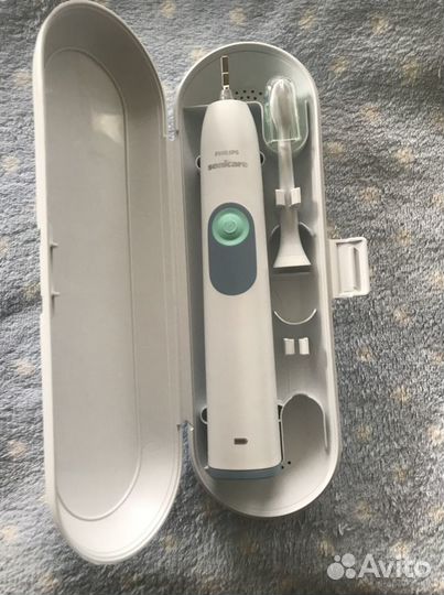 Новая эктрическая зубная щетка philips sonicare