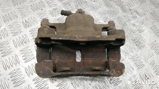 Суппорт тормозной передний левый nissan qashqai J1