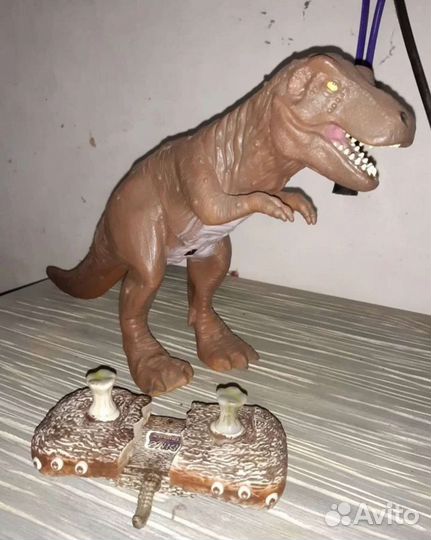 Радиоуправляемая игрушка робот динозавр