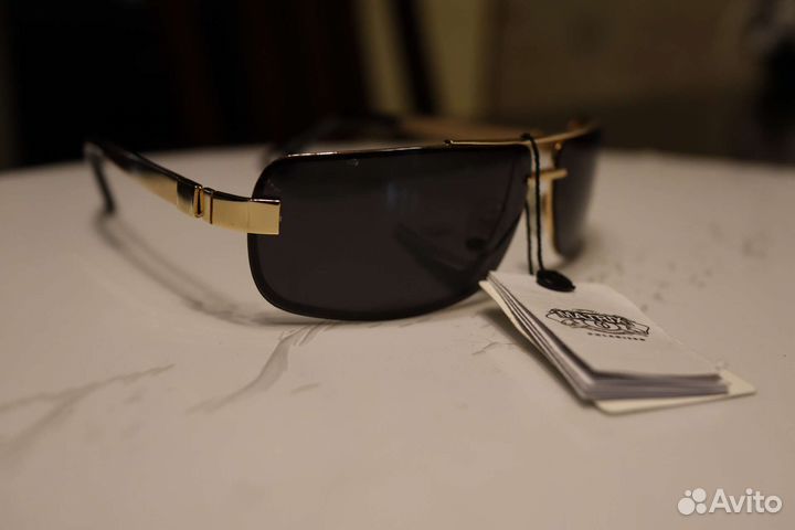 Солнцезащитные очки мужские