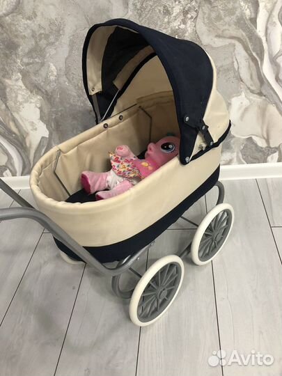 Игрушечная коляска для кукол