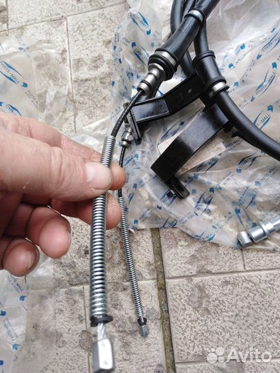 Трос стояночного тормоза kia sportage 2