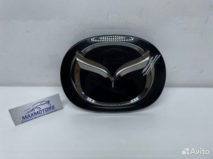 Эмблема передняя Mazda Cx-5 2021