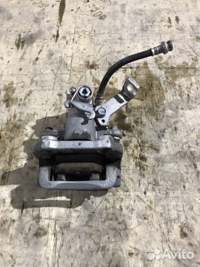 Суппорт задний левый Suzuki Vitara SX4 Оригинал