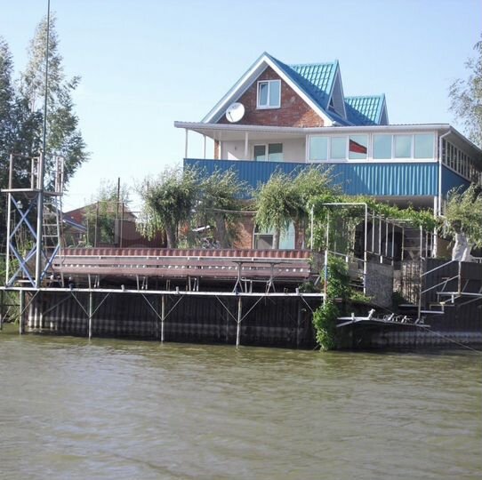 Дом 450 м² на участке 15 сот.