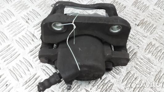 Суппорт тормозной передний правый dacia sandero 1