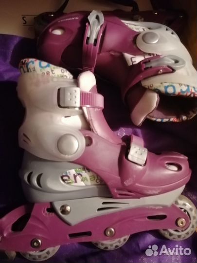 Роликовые коньки