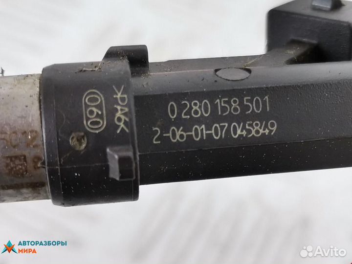 Форсунка Opel Corsa D 2007 55562250