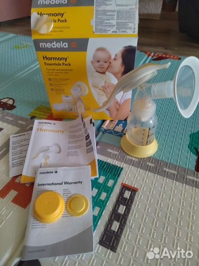 Молокоотсос medela swing flex электрический