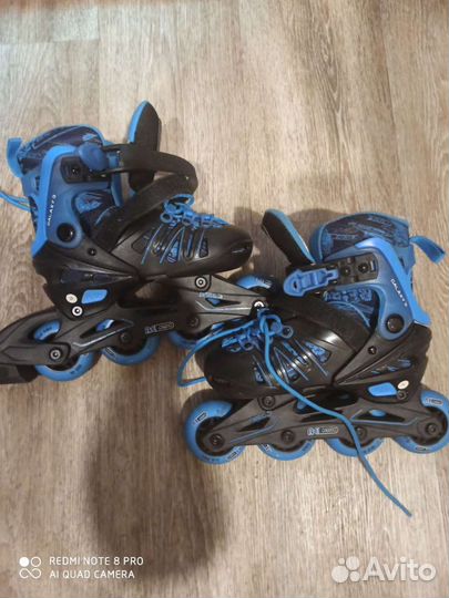 Роликовые коньки