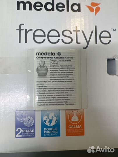 Молокоотсос двойной medela freestyle double новый