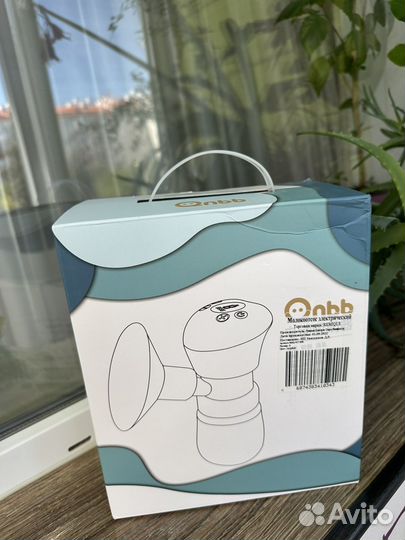 Молокоотсос электрический новый