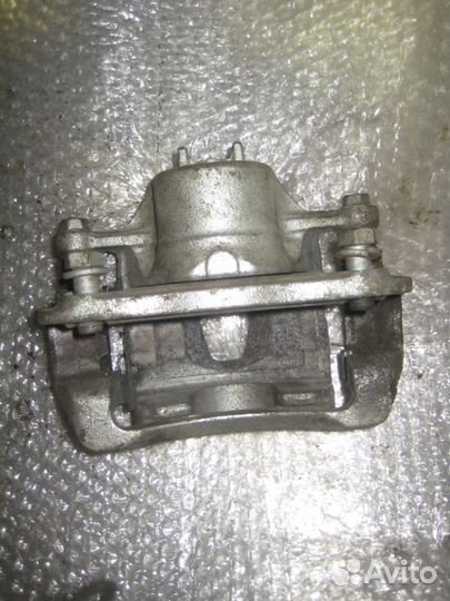 Суппорт тормозной передний левый Hyundai Solaris