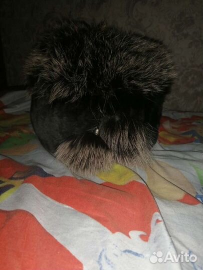 Женские меховые шапки