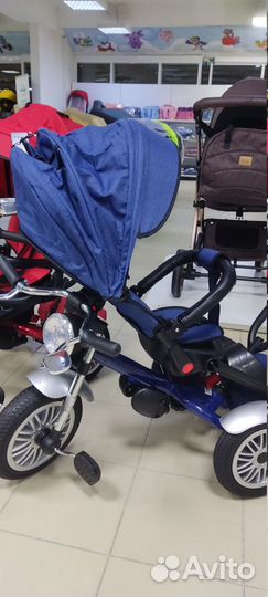 Детский трехколесный велосипед поворотное сиденье