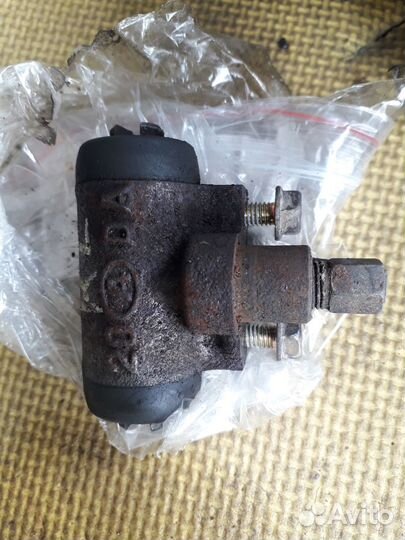 Цилиндр тормозной задний Nissan Tiida C11 (контр)