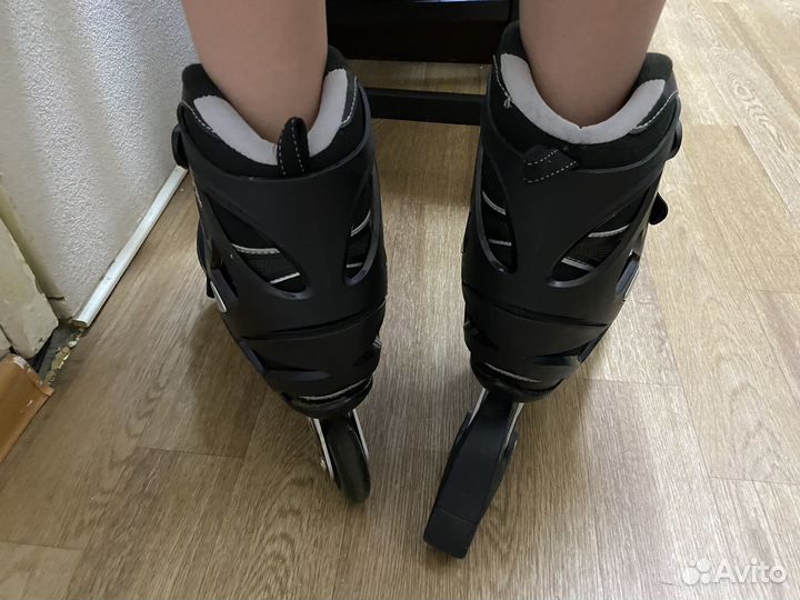 Роликовые коньки