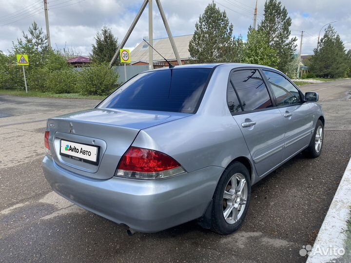 Mitsubishi Lancer 1.6 МТ, 2005, 301 000 км