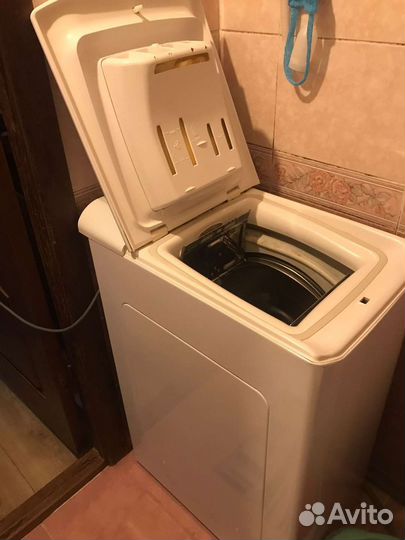 Стиральная машина с вертикальной загрузкой