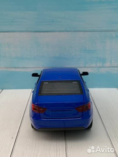 LADA Vesta седан моделька авто/игрушка 1:24