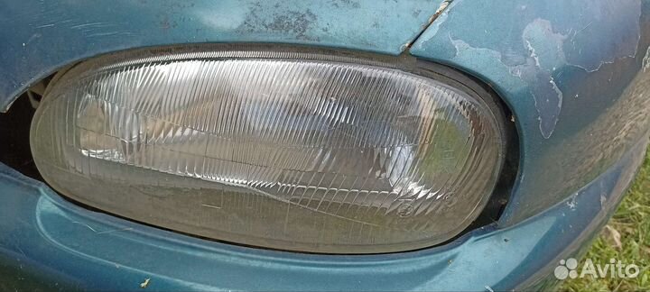 Фара на mazda 121