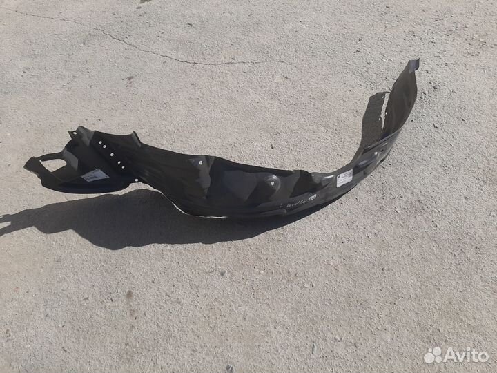 Подкрылок передний левый Toyota Corolla 120