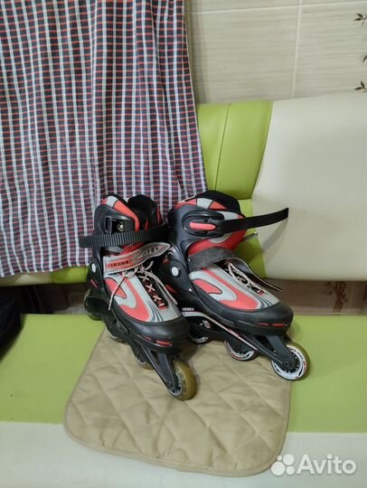 Роликовые коньки