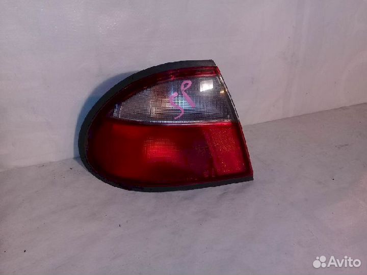 Фонарь (стоп сигнал) задний левый 220-61700 белый