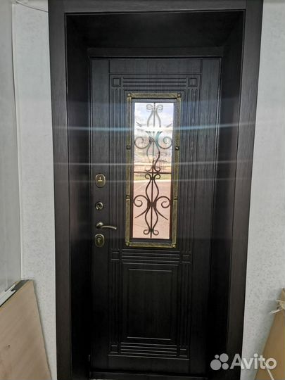 Дверь входная металлическая с ковкой 