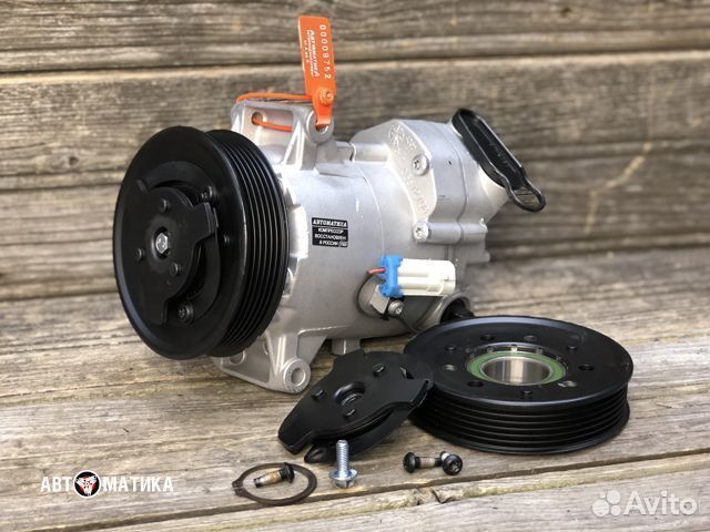 Компрессор кондиционера Opel Astra J