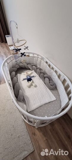 Детская кроватка с продольным маятником