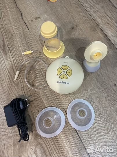 Молокоотсос medela электрический