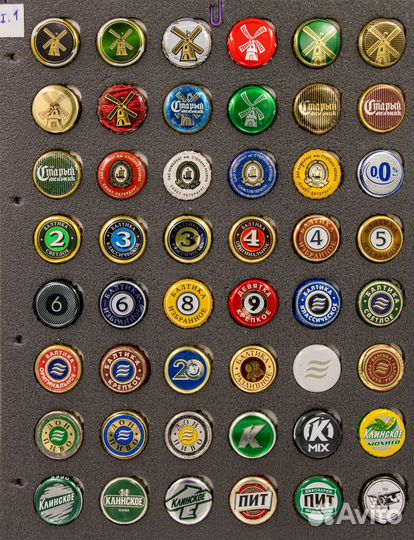 Коллекция пивных пробок 495 штук в альбомах