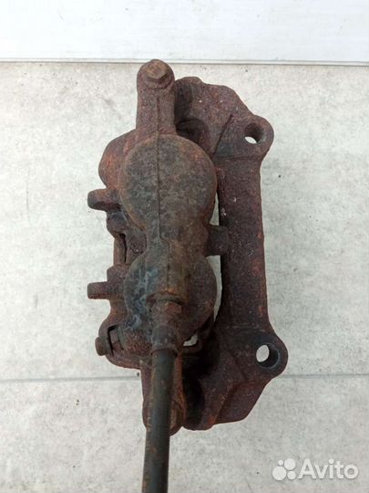 Суппорт тормозной передний левый Renault Espace 3