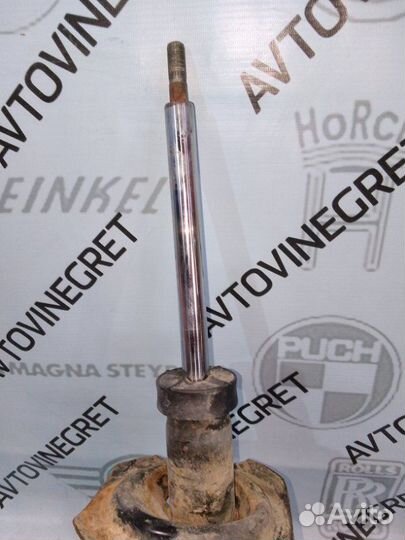 Стойка амортизатор передняя левая Nissan Primera