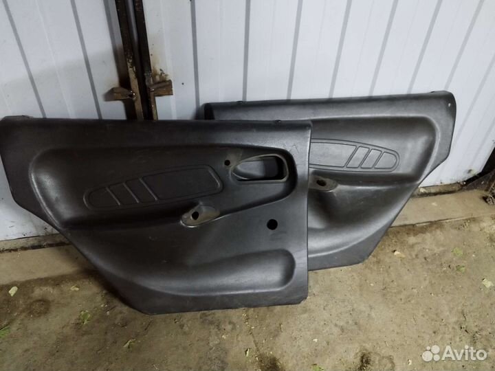 Задняя дверная карта левая ваз 2114