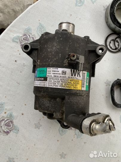 Компрессор кондиционера Opel Astra H