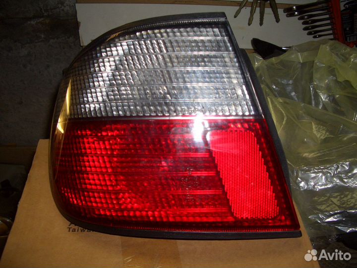 Фонарь левый Ниссан Примера Р11 с96-02г новый Depo