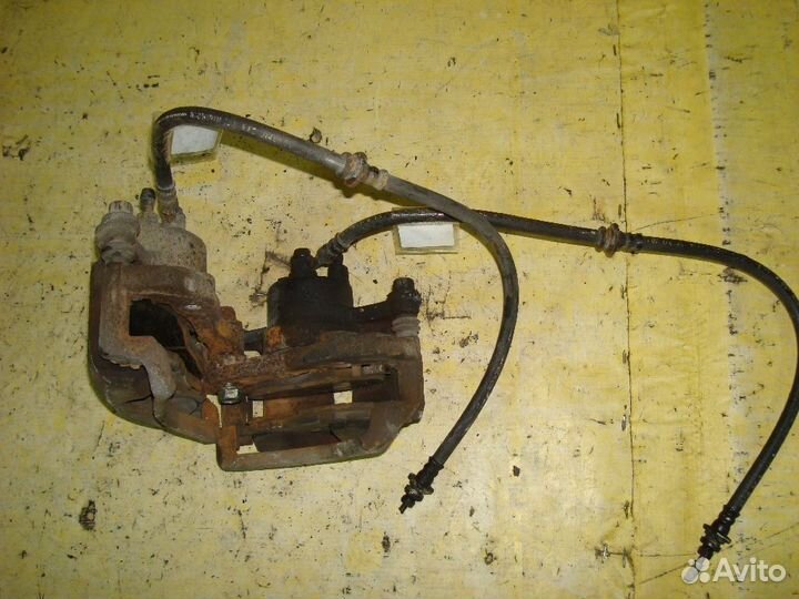 Суппорт Nissan Note E11 (Переднее)