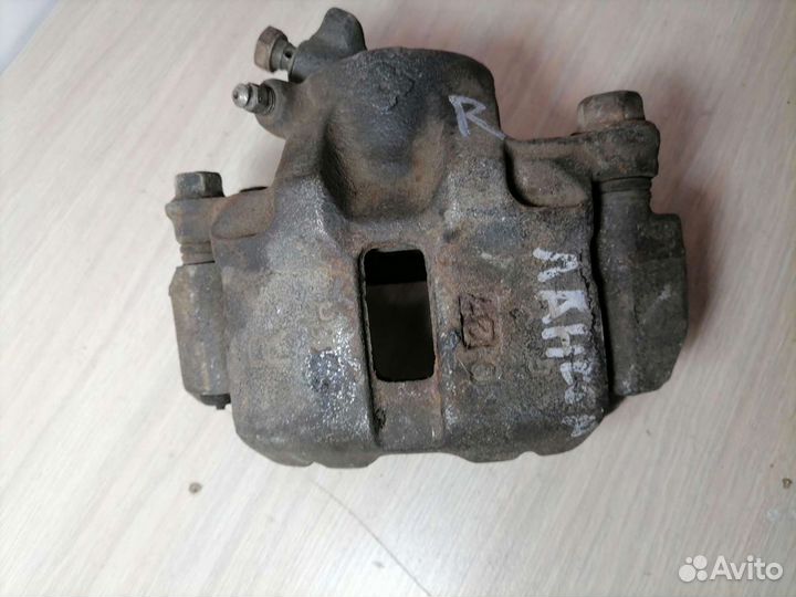 Суппорт передний правый Mitsubishi Lancer 8