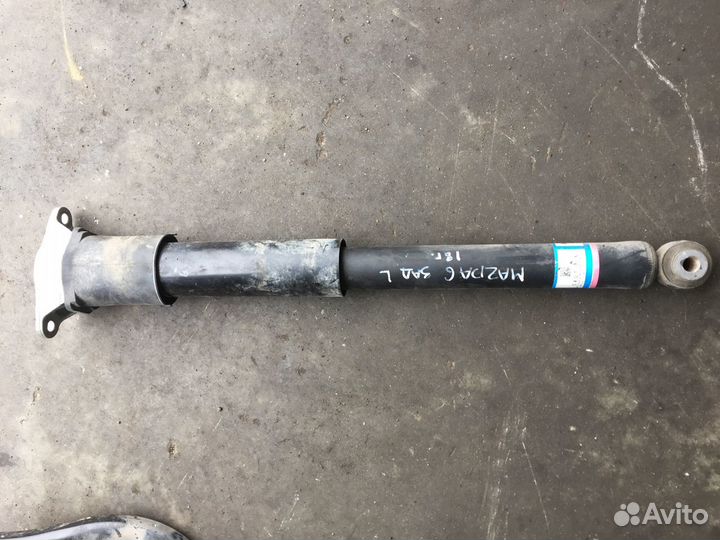 Мазда 6 Амортизатор задний левый