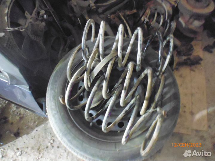 Mitsubishi lancer 9 пружина передняя